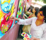 Students take part in a painting competition during Soch 10 at Panjab University on Monday.