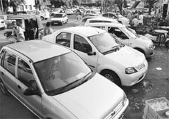 Vehicles parked on the road in the market of Sector 7, Panchkula, on Monday. 