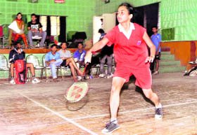 A player makes a move in the Uttarakhand Technical University Inter-College Badminton Tournament held in Dehradun on Monday.