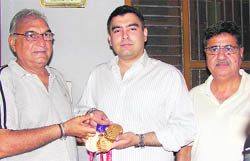 Shooter Gagan Narang with Chief Minister Bhupinder Singh Hooda in Rohtak. 