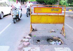 Even as a part of a road has caved in near Rose Garden, the Municipal Coropration has failed to take any action