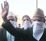 Chairman of the All-Parties Hurriyat Conference (APHC)  Syed Ali Shah Geelani with party supporters after addressing a conference in Srinagar  on Monday.