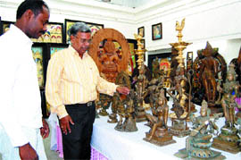 People take a look at Tamil Nadu handicraft during an exhibition in Amritsar.