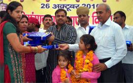 Sriganganagar Founders Day celebrations were marked with distribution of gifts by District Collector Subeer Kumar.