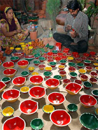With Diwali approaching, potters busy painting diyas in Bathinda on Wednesday