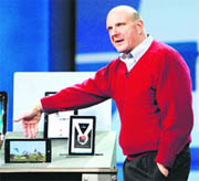 Microsoft Chief Executive Steve Ballmer shows Slate PCs (from L-R) Archos, Pegatron and Hewlett-Packard during his keynote speech before the 2010 International Consumer Electronics Show in Las Vegas, in this January 6, 2010 file photo. Microsoft's stock has drifted lower, and is now down 16 per cent for the year, despite a surge in tech stocks that has pushed the Nasdaq up 10 per cent in the same time. 