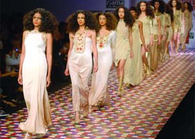 Models display the creations of designer Renu Tandon on the last day of the Wills Lifestyle India Fashion Week in New Delhi