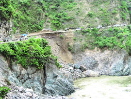 A damaged road on the Nainital-Almora highway.