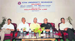 Dignitaries at a seminar on relevance of law at ICFAI University in Dehradun