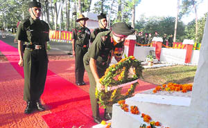Lt-Gen RS Sujlana, Commandant, IMA, places a wreath at the Lal Gate War Memorial in Dehradun on Wednesday.