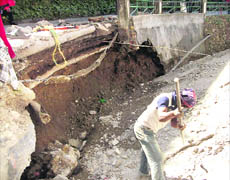 An illegal construction that caved in at Camels Back Road damaging telephone cables and the main drinking pipeline in Mussoorie.
