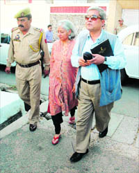 Centres interlocutors Dilip Padgaonkar and Radha Kumar arrive at the house of veteran journalist Balraj Puri at Karan Nagar in Jammu on Wednesday.