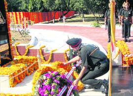 An Army officer lays a wreath at the Amar Jawan Jyoti in the Tiger Division cantonment in Jammu on Wednesday.