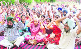 Government employees hold a protest in Ludhiana on Wednesday