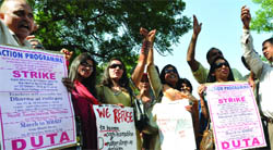 DU teachers protest against the implementation of the semester system at the undergraduate level at Jantar Mantar in New Delhi 