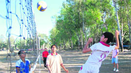A match of the District Volleyball Championship being played at the Parade Ground in Dehradun on Thursday.