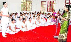 A girl answers a question during a quiz at Mahila Kanya Gurukul Mahavidyalaya in Haridwar on Thursday.