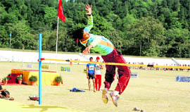An athlete performs a high jump at the 8th National Inter-District Athletics Meet held at BHEL in Haridwar on Thursday.