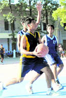 A match of the AC Dev Memorial Basketball Championship under way in Dehradun on Thursday.