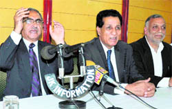 Agriculture Minister Ghulam Hussain Mir and Minister for Medical Education and Sports RS Chib (centre) at a media conference in Jammu on Thursday