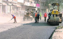 MC workers relaying a road to Partap Chowk in Ludhiana.