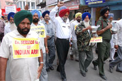 Members of the Ex-servicemen Welfare Union, Punjab, carrying out a protest march in support of their demands, including One rank one pension, in Bathinda 