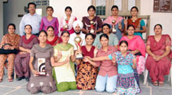 Students of Bhag Singh Hayer College for Women with trophy