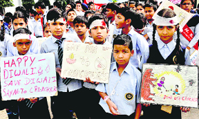 Students of Sri Guru Gobind Singh Senior Secondary School, Sector 35, hold an anti-cracker rally in Chandigarh on Friday.