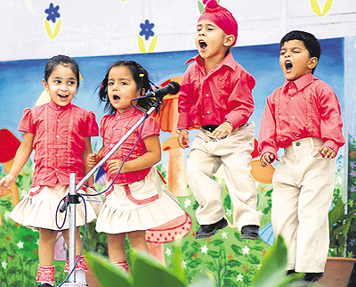 Students of the YPS, Mohali, revel during the annual song and rhyme day on Friday.