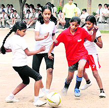 Players in action during a football match in Panchkula on Friday.