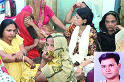 Sharmas family mourns his death.
