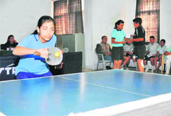 A player in action at the District Table Tennis Tournament in Dehradun on Friday. 