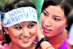 Members of the All Ladakh Students Joint Action Committee hold a protest in Jammu on Friday demanding a Central university in Ladakh