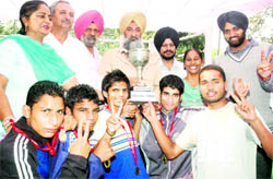 The winners with their trophies in Patiala on Saturday