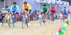 Students participate in a cycle race at the St Josephs Academy annual sports day in Dehradun on Saturday. 
