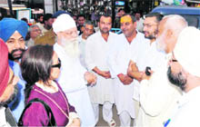 Members of the National Minority Commission and Sikh organisations talk to local representatives at the Bharat Scouts and Guide office in Haridwar on Saturday. 