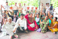 UKD members hold a protest in Dehradun on Saturday.