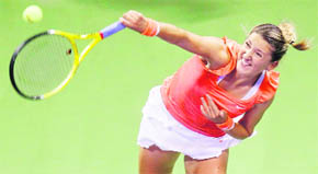 Victoria Azarenka of Belarus serves during the WTA Tour Championships in Doha on Saturday.  Reuters