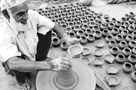 A potter makes diyas ahead of Diwali in Zirakpur on Sunday.