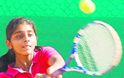 A player in action during the Manav Mangal Total Tennis Tournament in Mohali on Sunday.