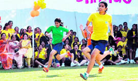 Girls participate in a race at Welham Girls School; and (right) boys take part in a fun race at St Josephs Academy in Dehradun on Sunday.