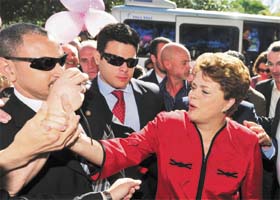 Dilma Rousseff, Brazils presidential candidate from the ruling Workers' Party, arrives to vote in Porto Alegre