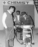 Policemen outside the chemist shop on the Zirakpur-Patiala highway where the firing incident took place