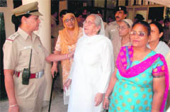 Riot victims of 1984 come out of the DC office after giving him a representation of their demands in Sector 17, Chandigarh