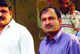 Shashi Shekhar Sharma being produced at the Patiala House Courts in New Delhi