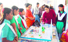 Students at a science exhibition put up by government schools in Dehradun on Monday.