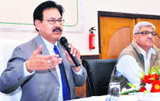   RBS Rawat, Principal Chief Conservator of Forests,  addresses a function in Dehradun on Monday. 