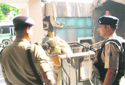 Security personnel keep vigil at the Civil Secretariat in Jammu on Monday. The secretariat is scheduled to start functioning here from November 8.