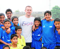Craig Smith with players from YFC in Rurka Kalan, Jalandhar.