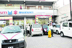 A car showroom in Dehradun on Tuesday.